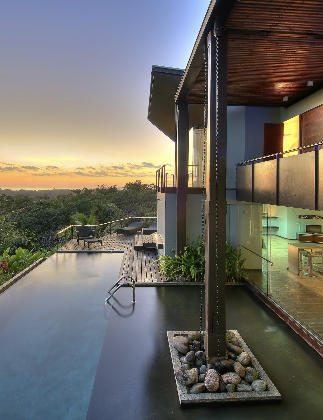 Tropical Villa infinity pool at sunset with ocean views - Villa Los Laureles Costa Rica