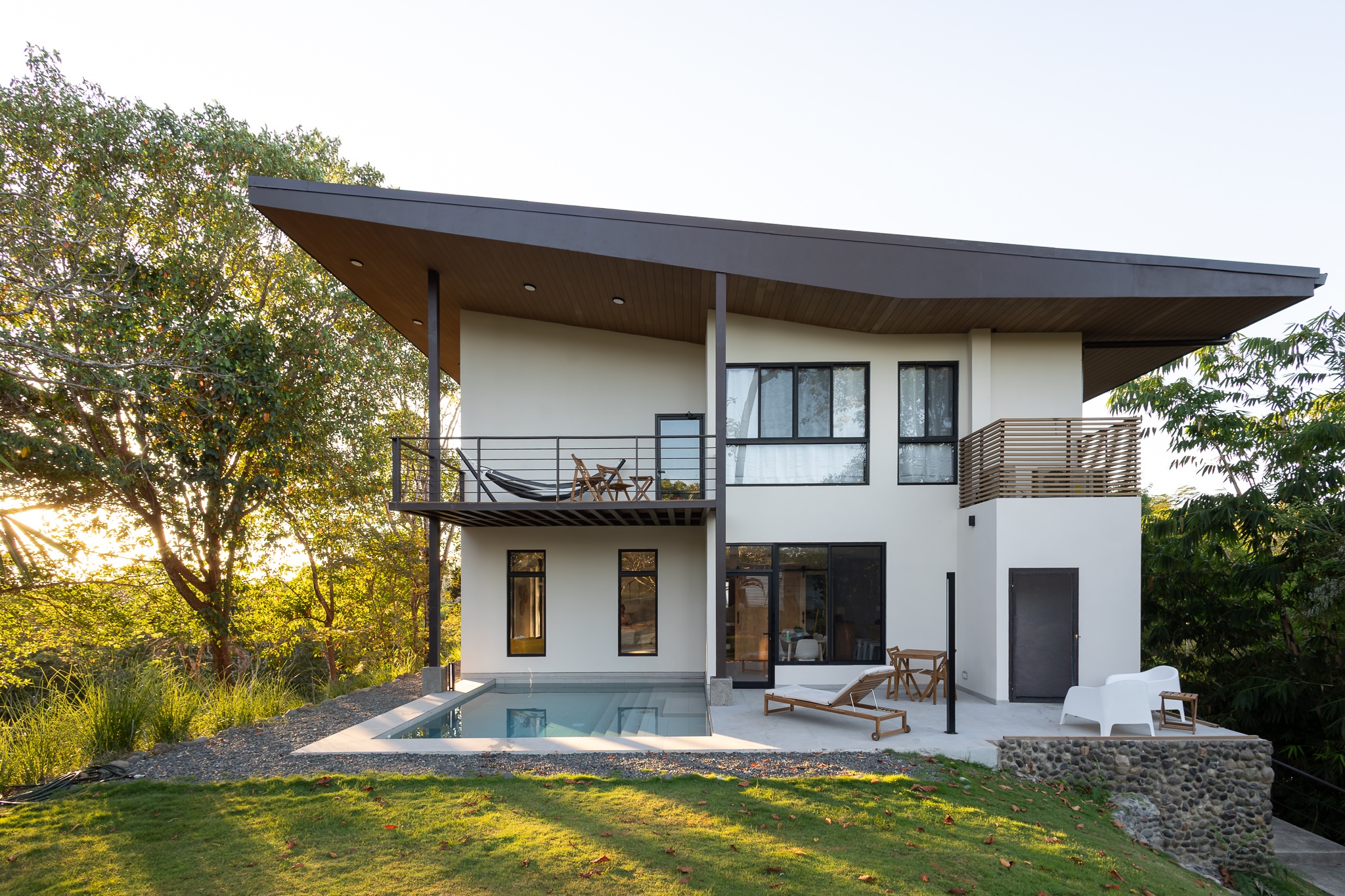 Hilltop Villa Los Laureles — modern architecture with private pool at sunset